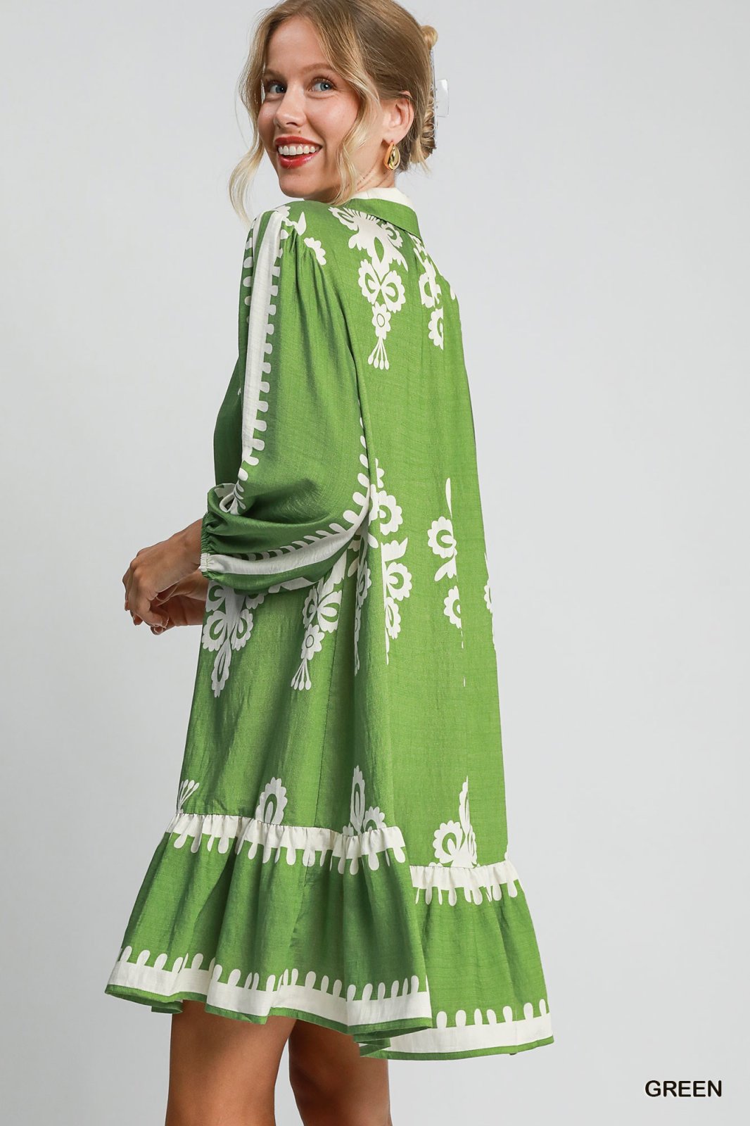 Mara Dress in green, featuring elegant design perfect for coastal boutique clothing and tropical vacation dresses.
