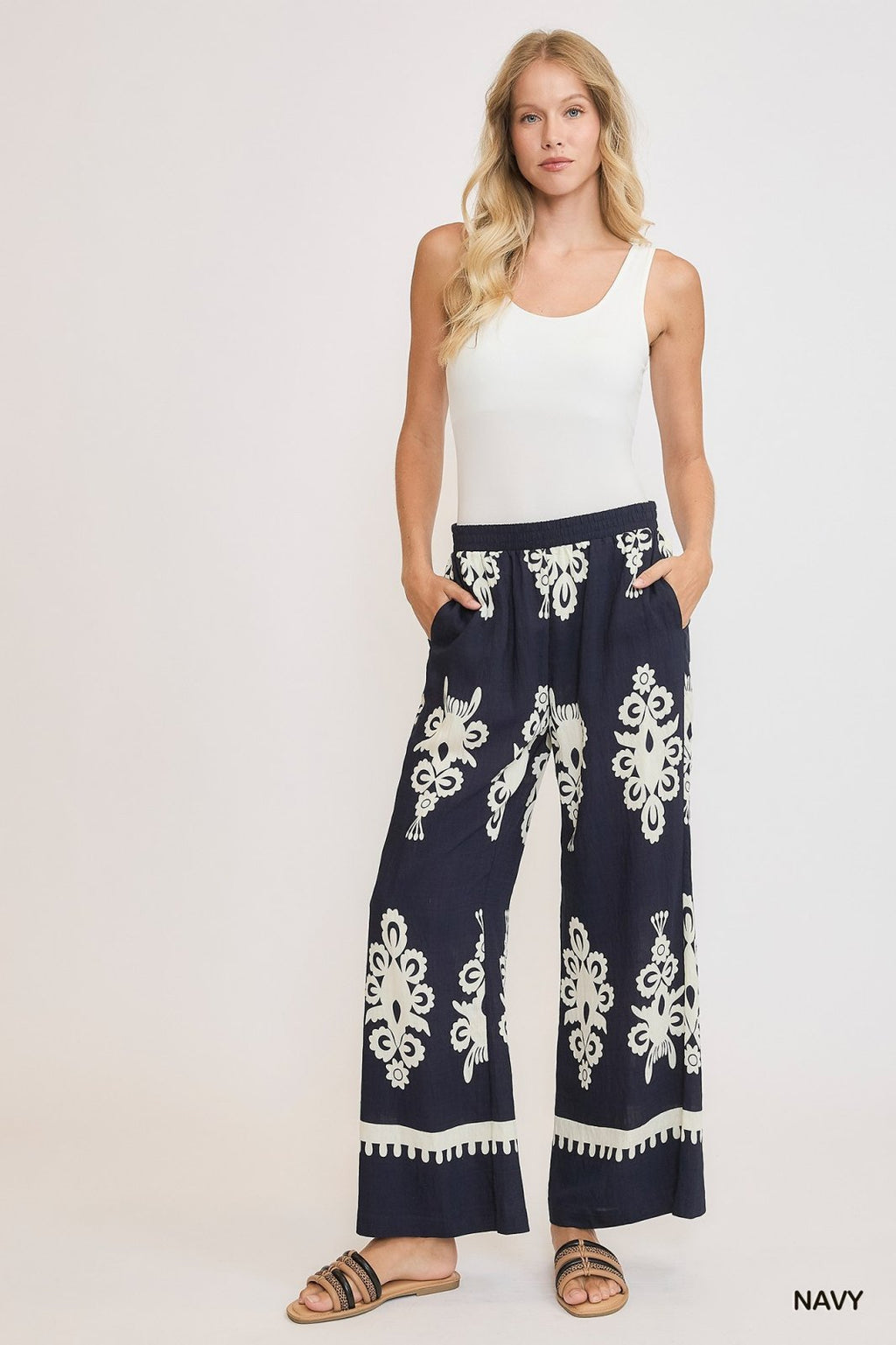 Navy border print pants with elastic waistband, perfect for coastal boutique clothing and beach dresses.