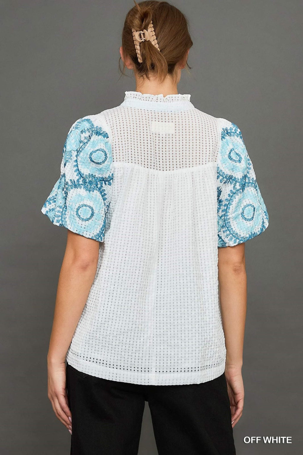 Eleanor Top in off-white with blue patterned sleeves, perfect for coastal boutique clothing and stylish women's tops.