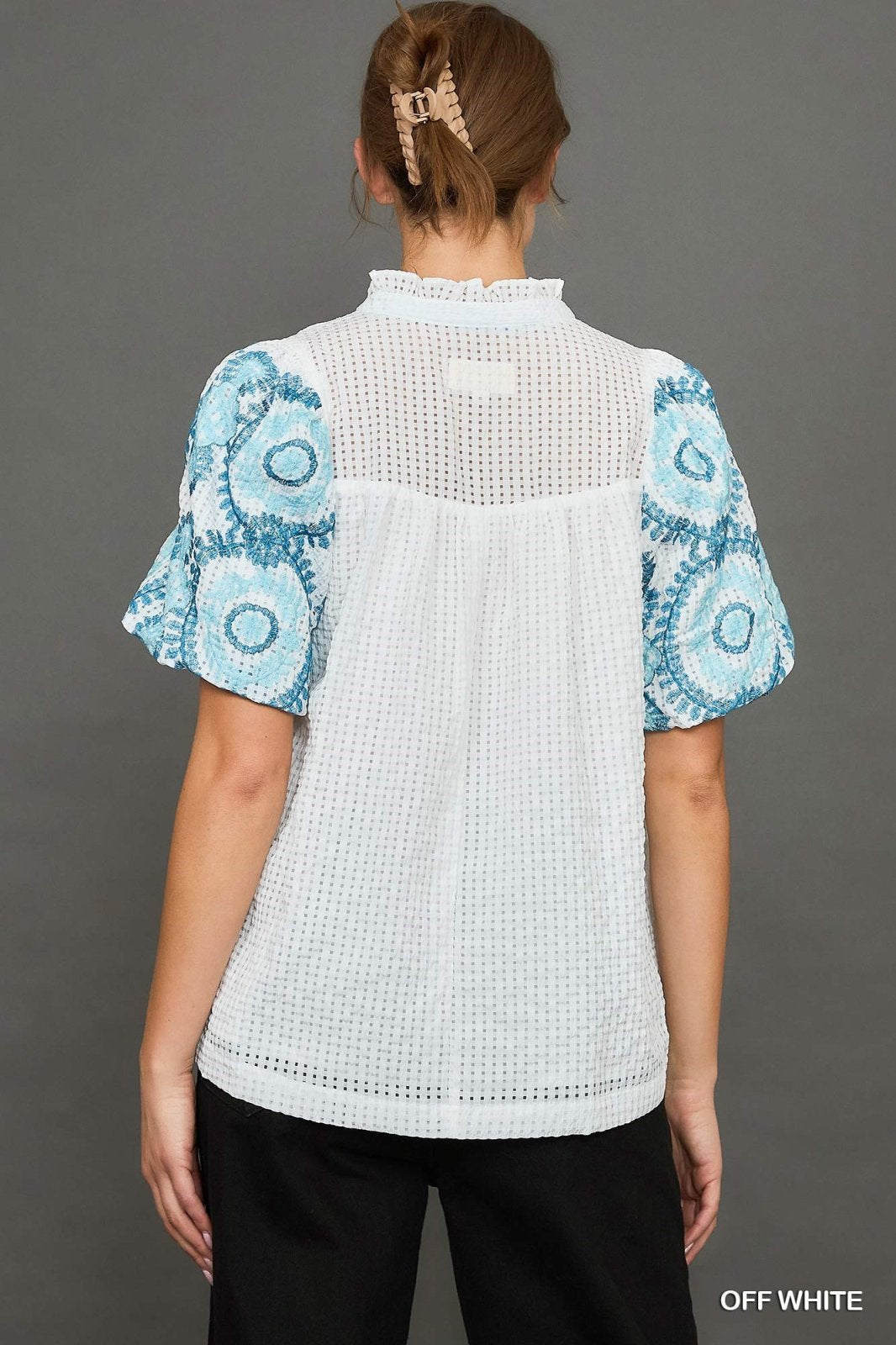 Eleanor Top in off-white with blue patterned sleeves, perfect for coastal boutique clothing and stylish women's tops.