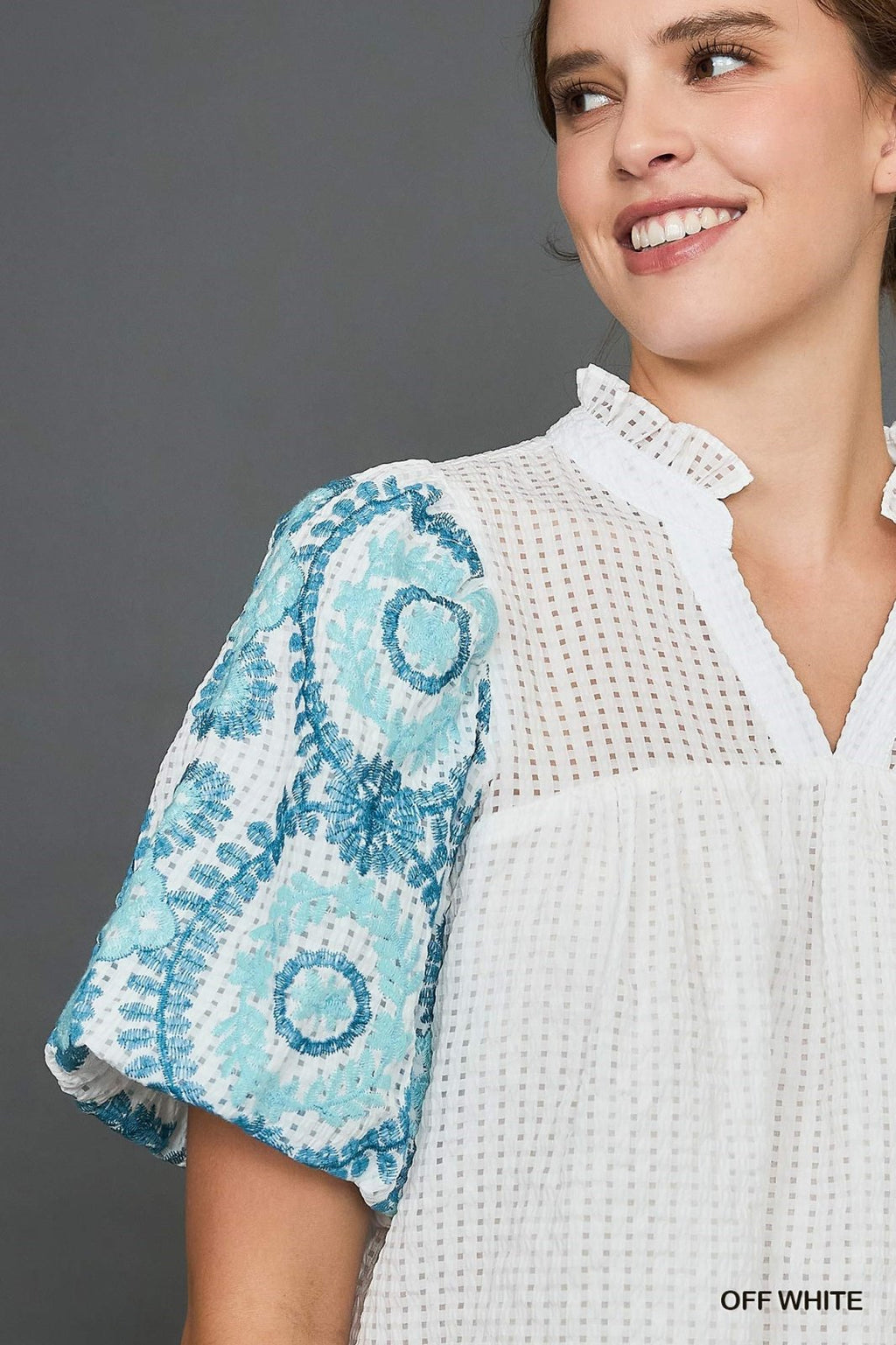 Eleanor Top features a stylish checkered seersucker design, perfect for coastal boutique clothing and tropical vacations.