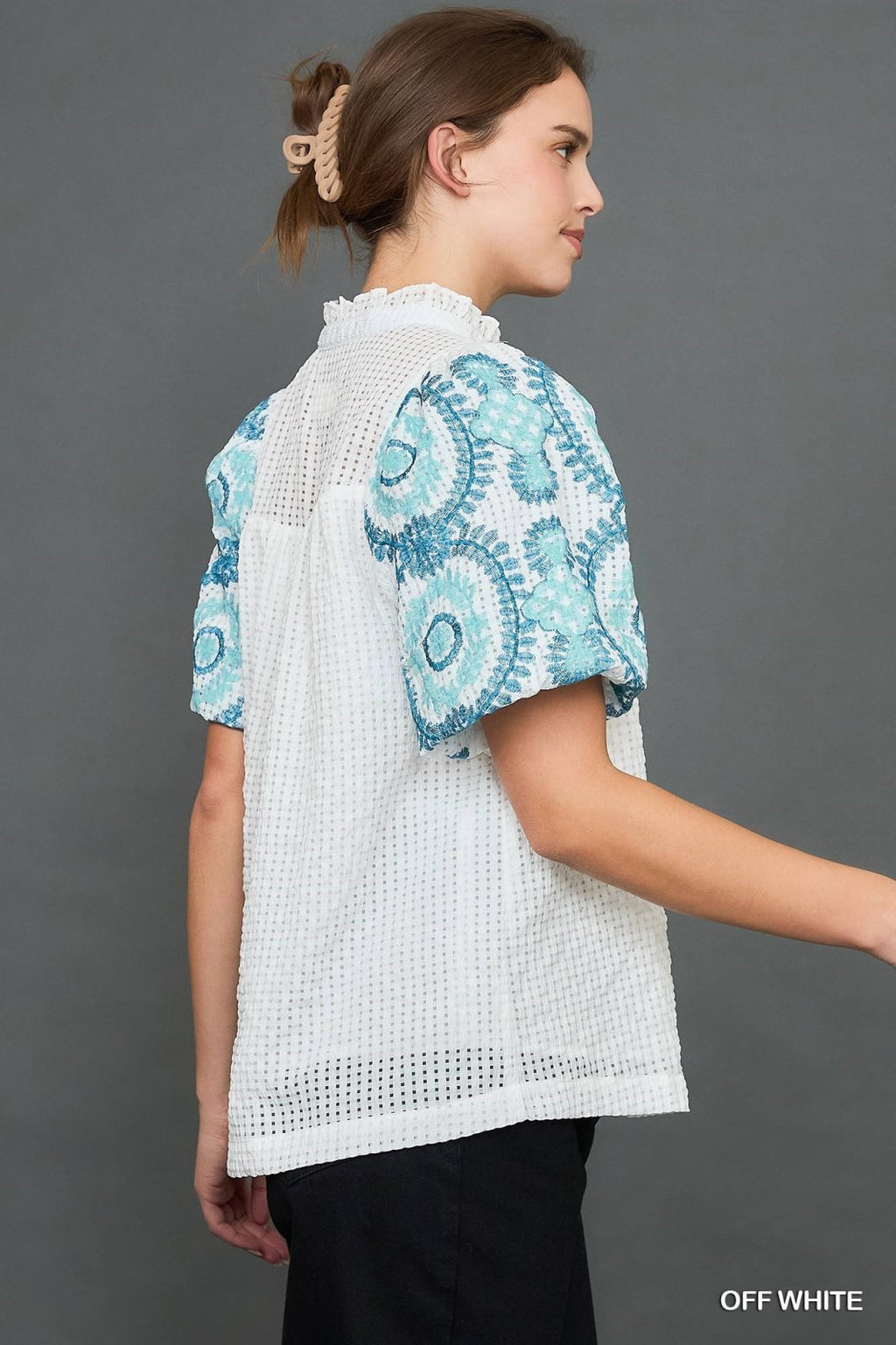 Eleanor Top from a coastal boutique, featuring a stylish checkered seersucker design perfect for tropical vacations.