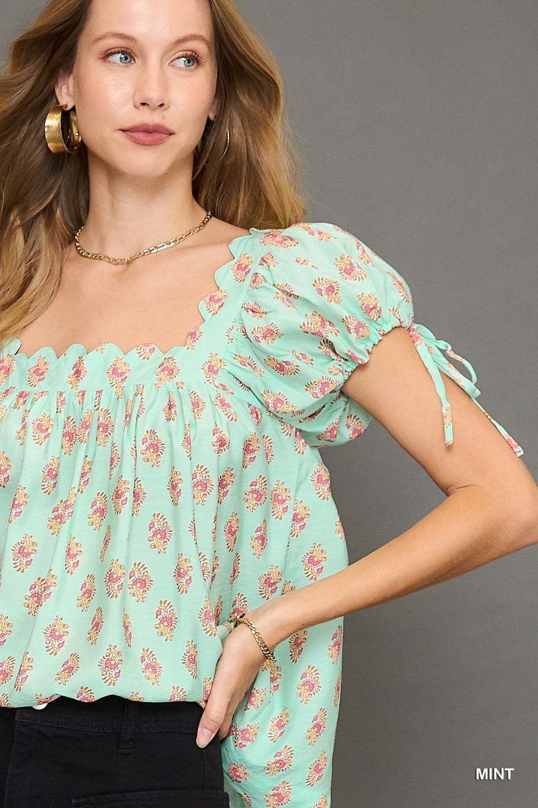 Sweet mint print top featuring playful floral design, perfect for coastal boutique clothing and stylish summer outfits.