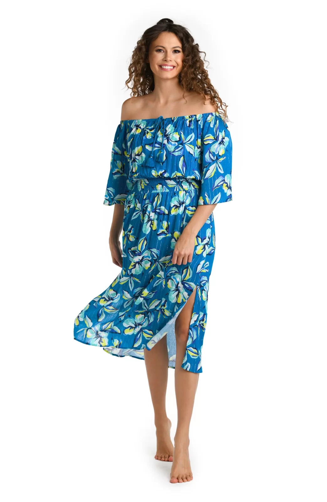 Model wearing the FIJI TROPICS off-the-shoulder cover-up dress, perfect for beach days and tropical vacations. Coastal boutique clothing.