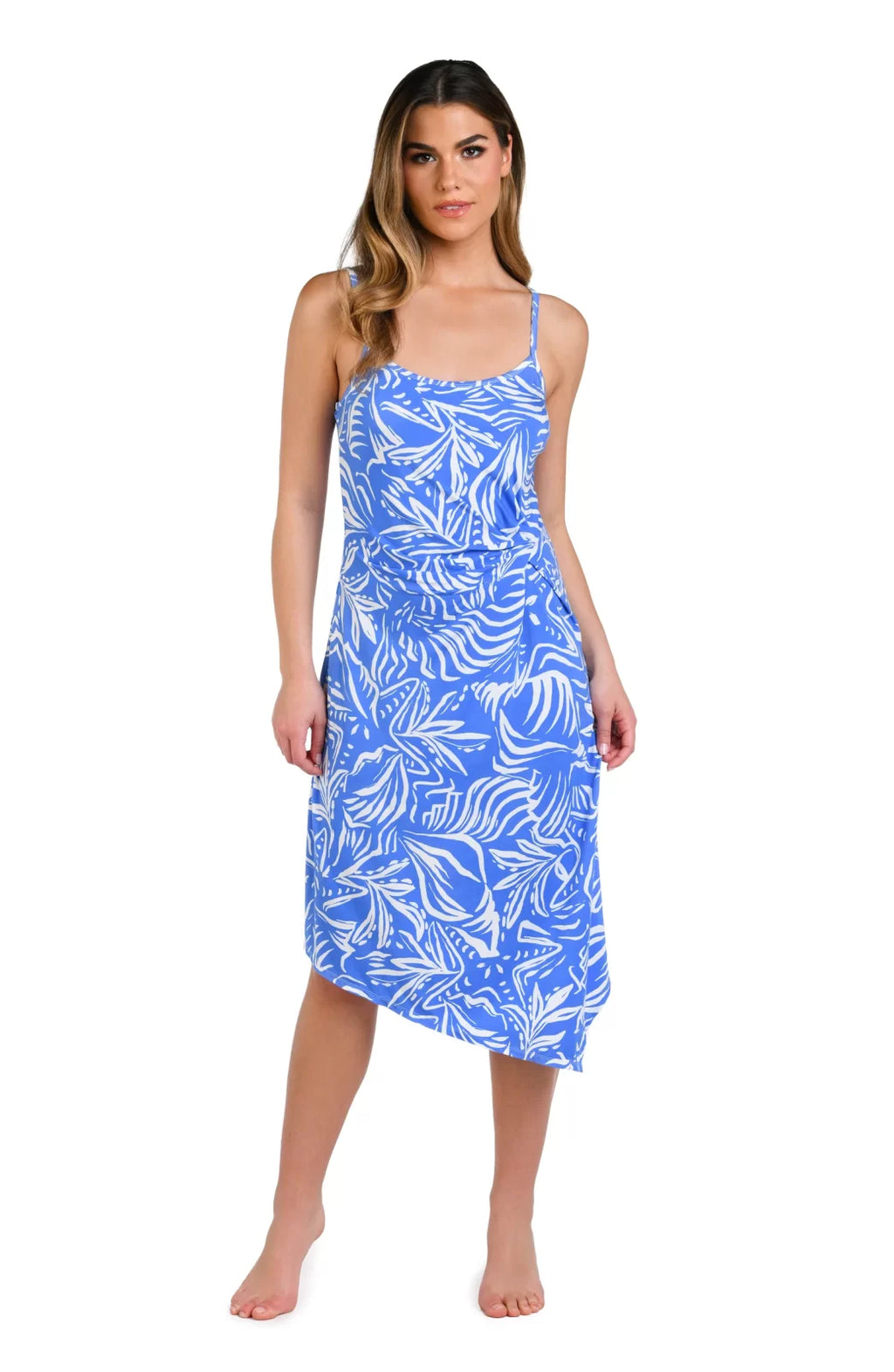 Beachside Bay Asymmetrical Draped Dress from Raggdoll Boutique in a vibrant blue tropical print for summer outfits Texas.