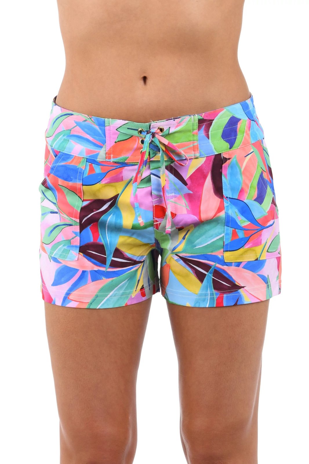 Colorful LA BLANCA tropical flower board shorts, perfect for summer vacations. Ideal women's bottoms for coastal boutique clothing.