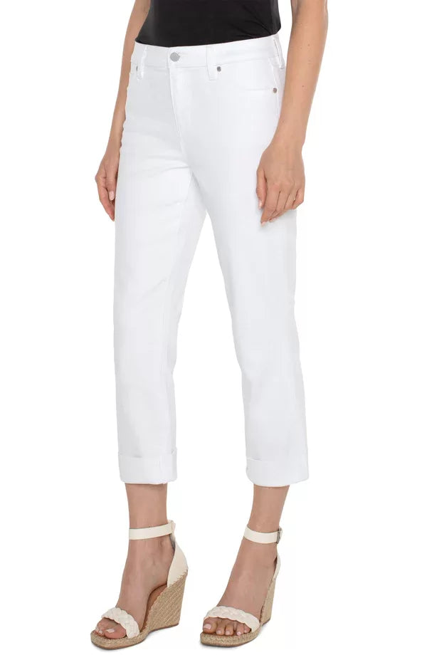 Model wearing Liverpool White Charlie Crop Cuffed Jeans with trendy wedges, perfect for summer outfits Texas.