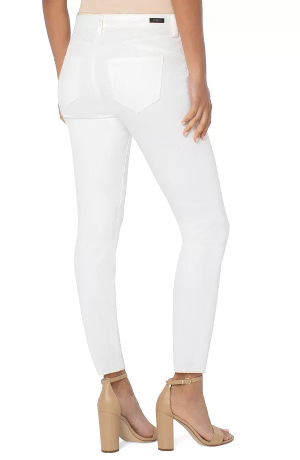 Back view of PIPER "HUGGER" ANKLE SKINNY PORCELAIN WHITE JEANS worn with nude heels, perfect for summer outfits Texas.