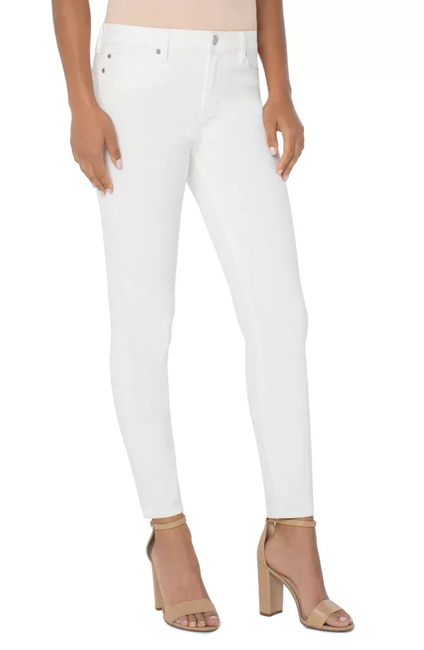 PIPER "HUGGER" ANKLE SKINNY PORCELAIN WHITE JEANS styled with trendy heels from Raggdoll Boutique.