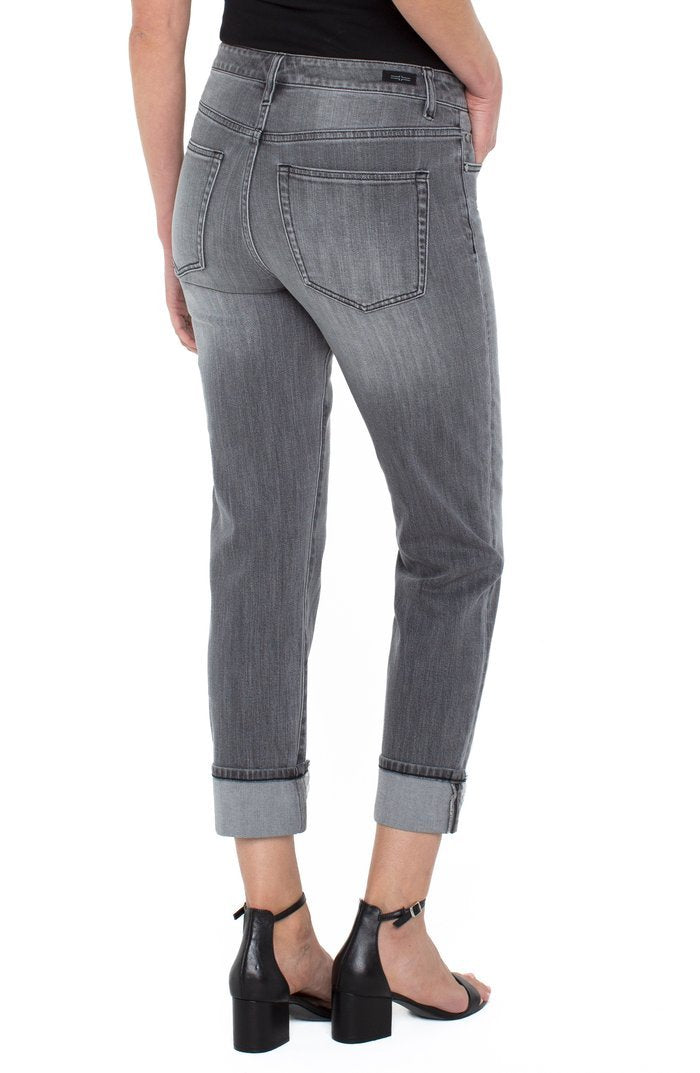 Back view of women's Liverpool midrise gray jeans with 5-pocket style. Perfect for coastal boutique clothing and casual outings.