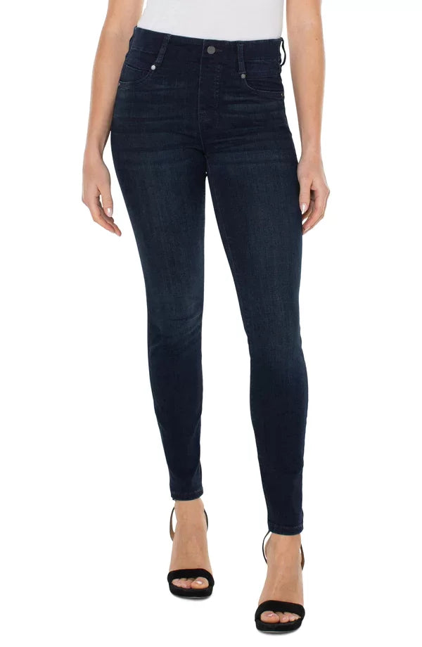 LIVERPOOL GIA GLIDER SKINNY JEAN DARK DEL RAY model wearing dark skinny jeans with mid-rise and 30" inseam for trendy coastal style.
