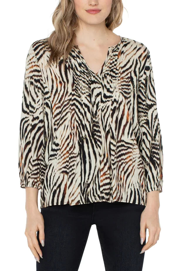 LIVERPOOL ANIMAL PRINT PEASANT BLOUSE from Raggdoll Boutique, trendy coastal style for summer outfits in Texas.