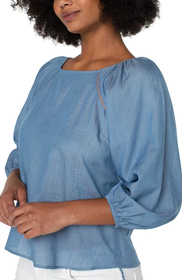 LIVERPOOL LIGHT CHAMBRAY TOP featuring 3/4 puff sleeves, square neck, and beautiful trim from Raggdoll Boutique.