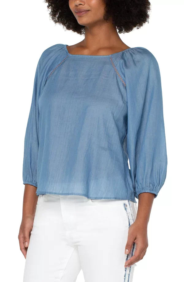LIVERPOOL LIGHT CHAMBRAY TOP featuring 3/4 puff sleeves, square neck, and flattering trim, perfect for coastal fashion and summer outfits.