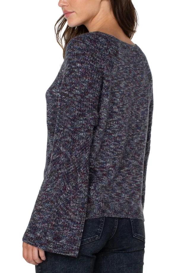 Side view of LIVERPOOL STARRY NIGHT SWEATER from Raggdoll Boutique, showcasing its trendy coastal style.