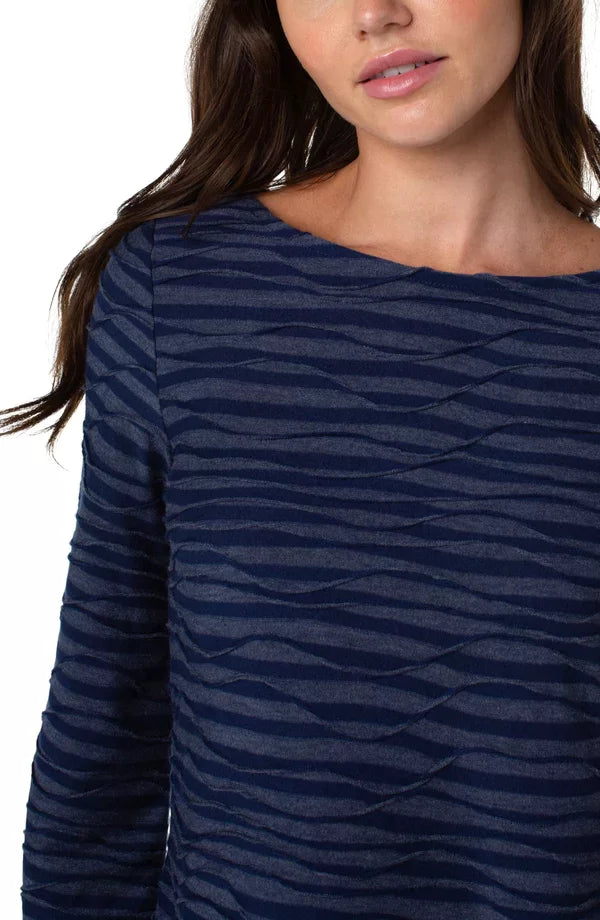 LP NAVY WAVE STRIPE FLARE SLEEVE KNIT TOP featured at Raggdoll Boutique, a trendy coastal fashion boutique.