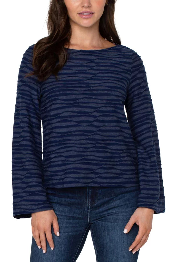 LP NAVY WAVE STRIPE FLARE SLEEVE KNIT TOP styled with denim, perfect for summer outfits Texas at Raggdoll Boutique.
