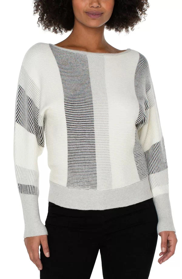 LIVERPOOL BOAT NECK DOLMAN SWEATER-CREAM BLACK displayed on model showcasing trendy coastal style at Raggdoll Boutique.