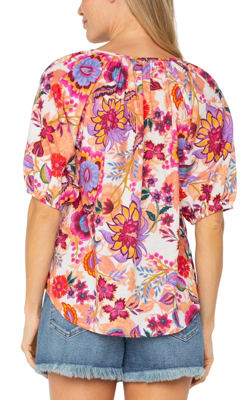 Vibrant floral button front top featuring puff sleeves, perfect for coastal boutique clothing and summer styles.