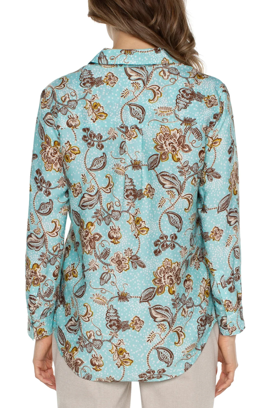 Back view of the Liverpool Pastel Button Up, a stylish top in floral design, perfect for coastal boutique clothing.