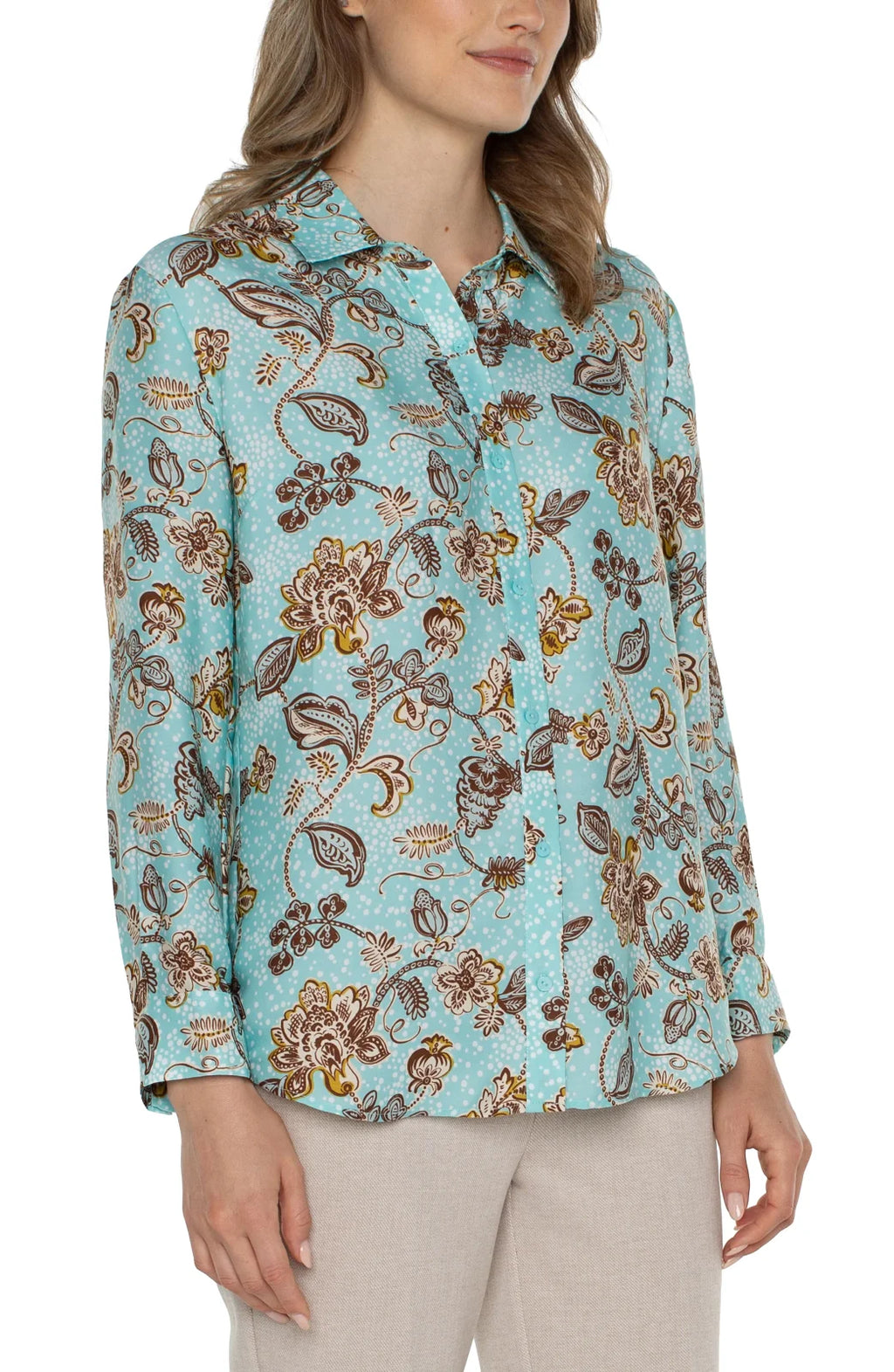Stylish Liverpool pastel button-up shirt featuring floral patterns, ideal for coastal boutique clothing and tropical vacations.