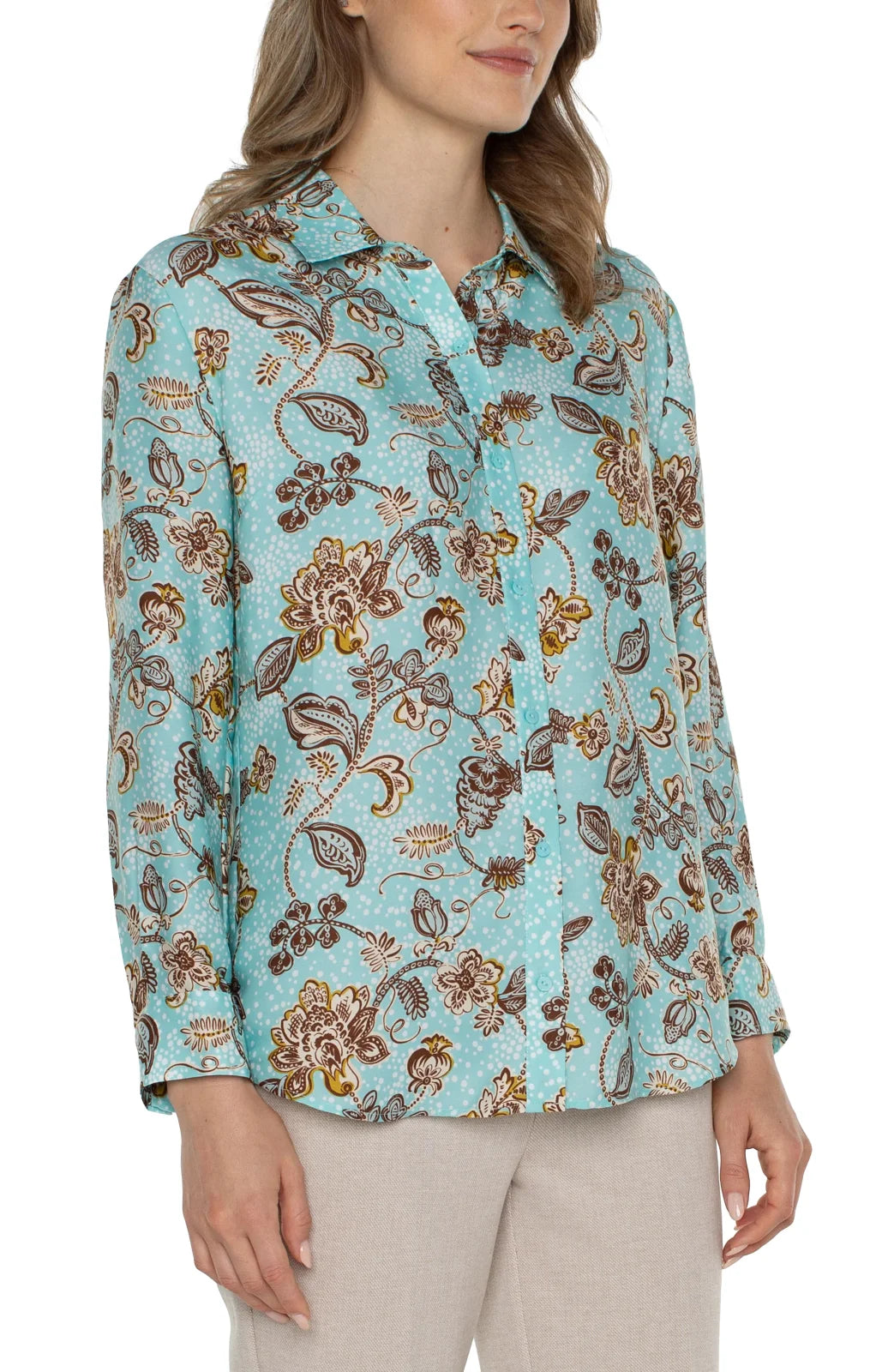 Stylish Liverpool pastel button-up shirt featuring floral patterns, ideal for coastal boutique clothing and tropical vacations.