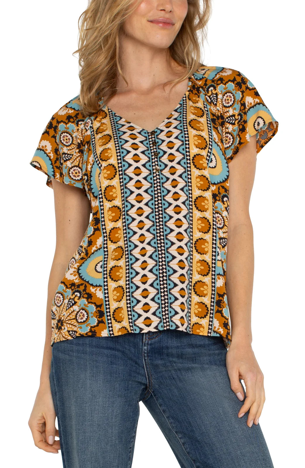 LP Ocean and Jasper Short Flutter Sleeve Top styled with denim for trendy coastal fashion.