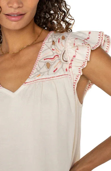 LP Embroidered Top with cut-out details, perfect for coastal boutique clothing and stylish women's fashion.