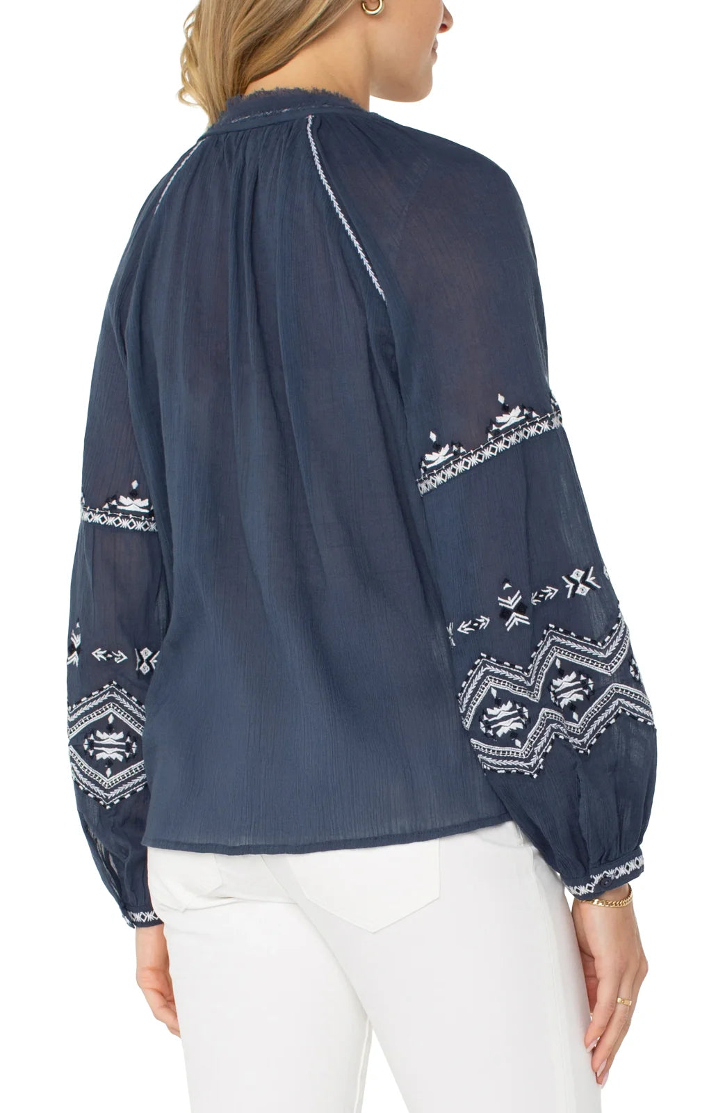 Liverpool Insignia blue long sleeve top with embroidered sleeves, perfect for coastal boutique clothing. A stylish women's fashion choice.