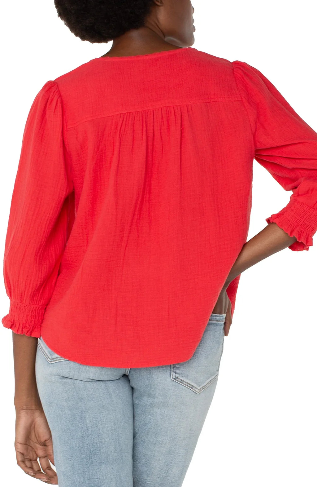 Back view of LP Geranium Embroidered Top in vibrant red, perfect for coastal boutique clothing and summer outings.