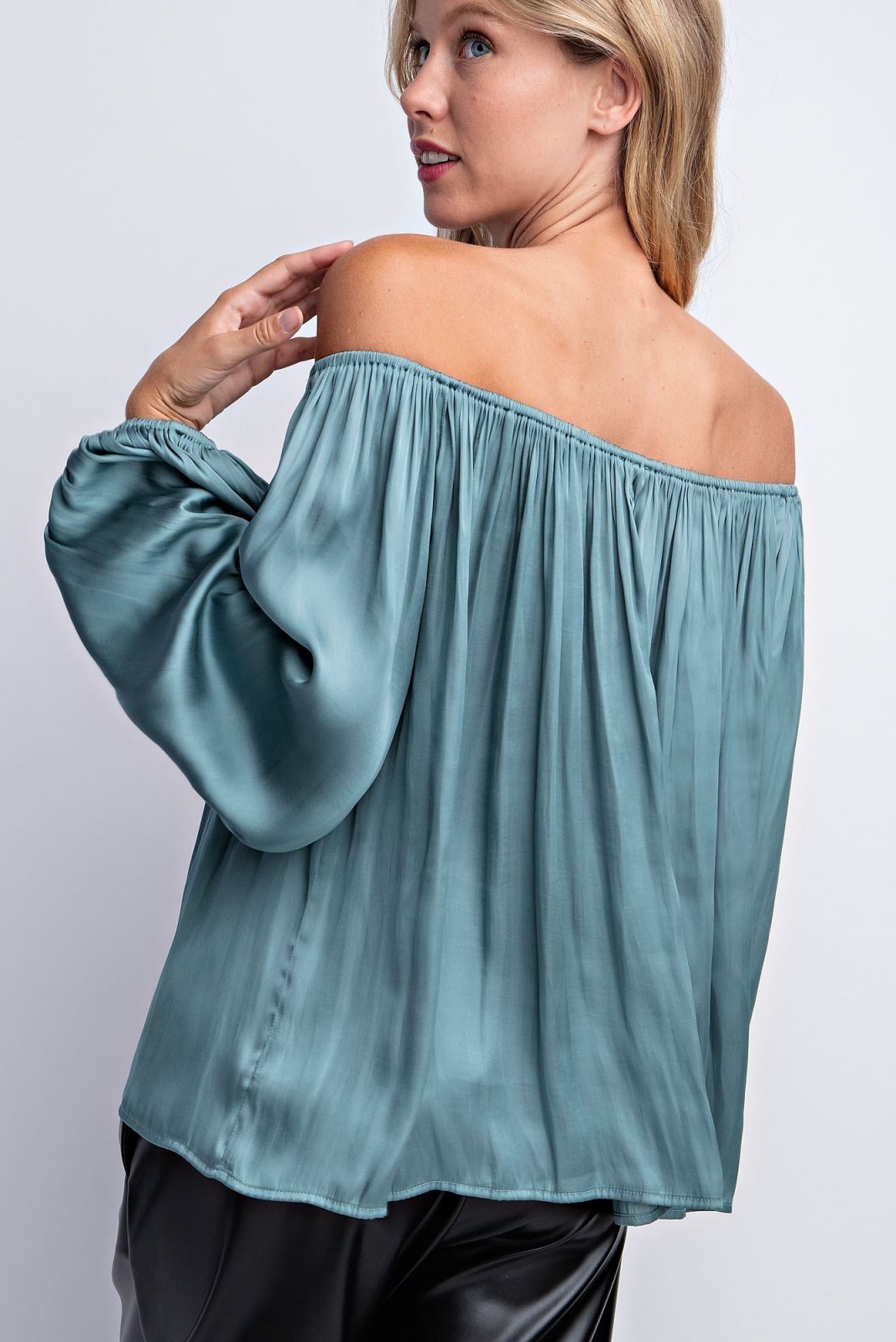Sea foam satin top for women, stylish and flowy, perfect for coastal boutique clothing and tropical vacation dresses.