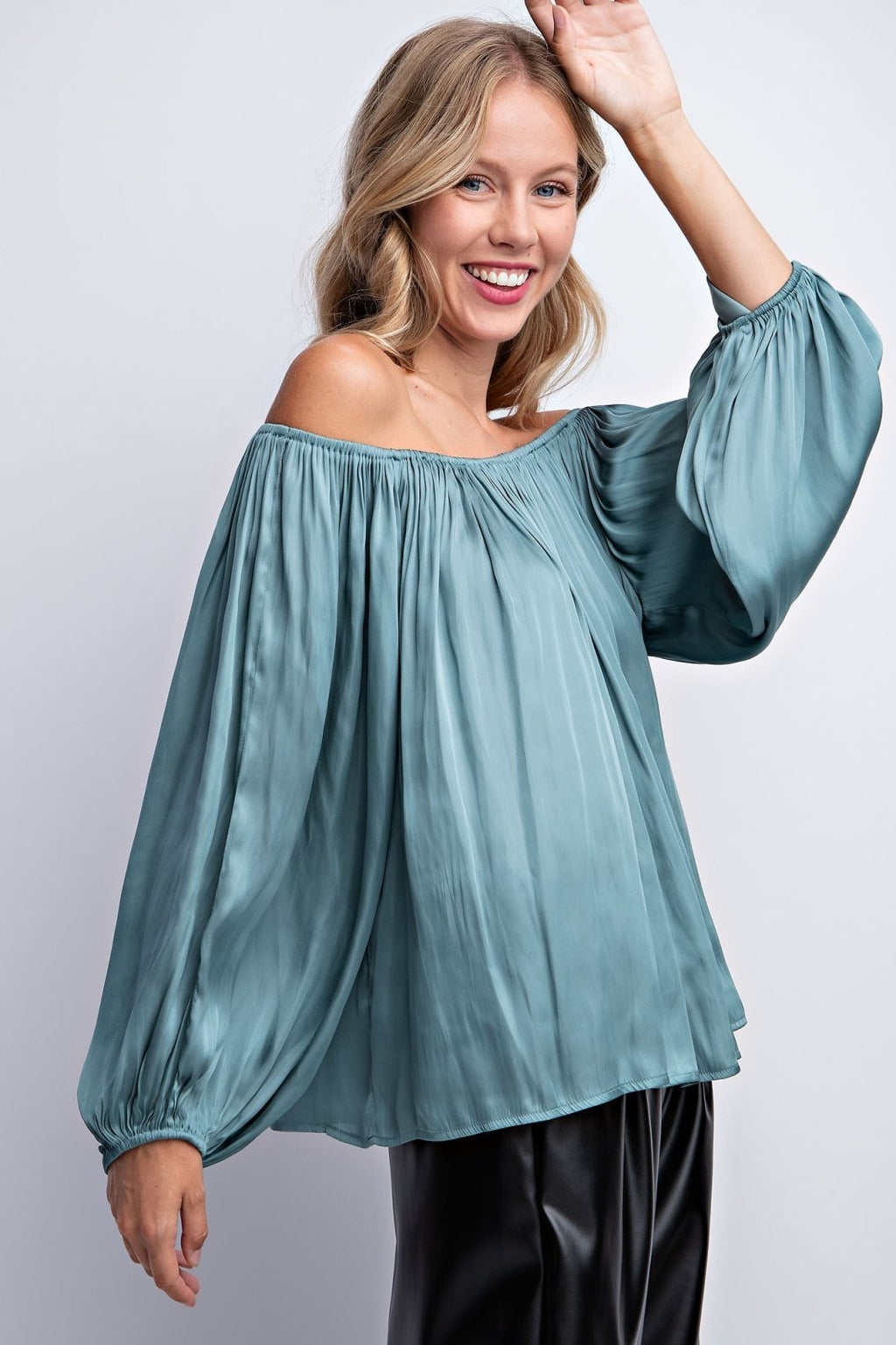 Stylish sea foam satin top for women, perfect for coastal boutique clothing and beach dresses. Curvy and chic fashion.