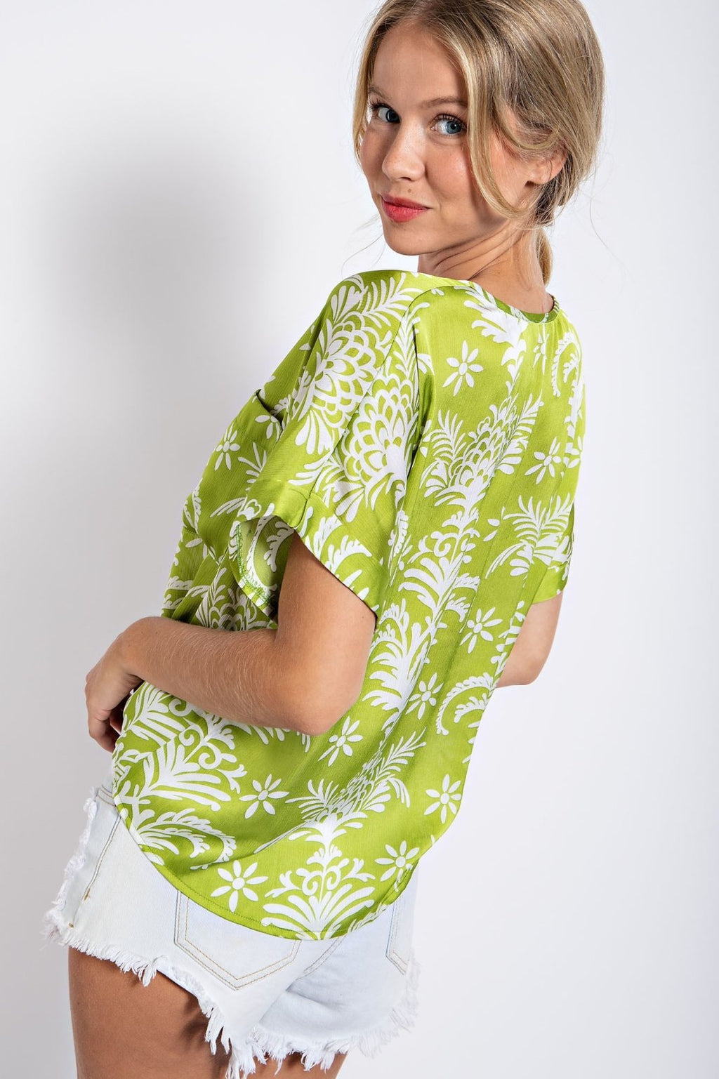 WHITE AND LIME SATIN PRINT TOP worn with shorts, perfect for summer outfits Texas from Raggdoll Boutique in Port Aransas.