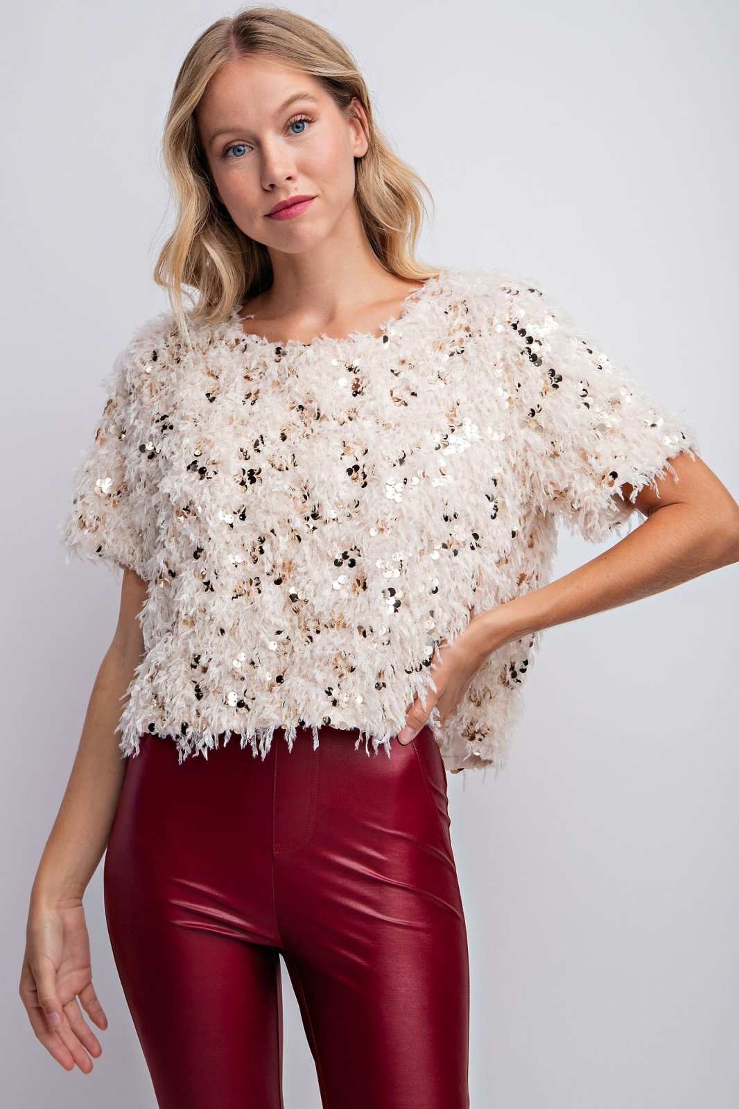 BEIGE SEQUIN SWEATER worn with red leather pants, perfect for summer outfits Texas from Raggdoll Boutique.