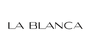 La Blanca logo representing trendy swimwear, perfect for women’s coastal fashion at Raggdoll Boutique.
