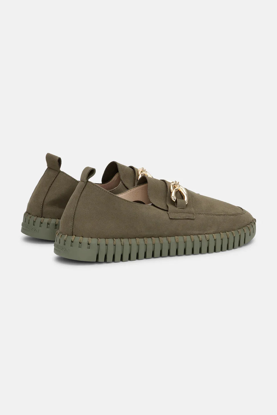 Stylish olive green slip-on shoes with decorative gold detail, ideal for trendy coastal outfits at Raggdoll Boutique.