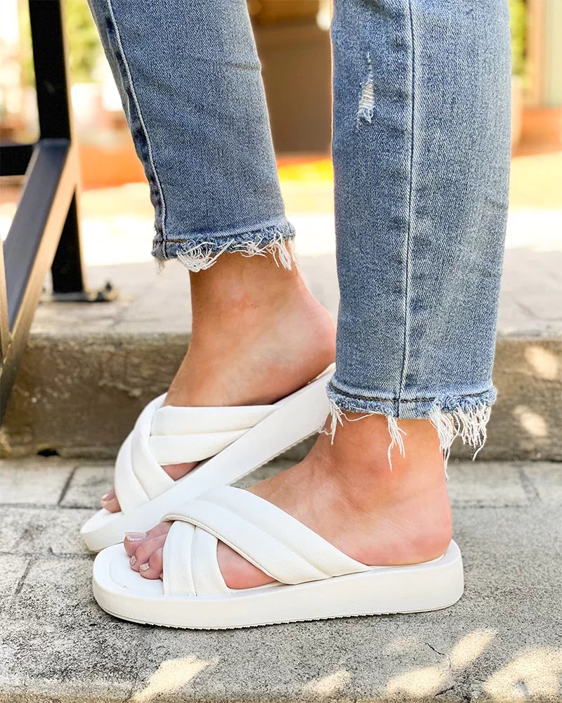 PIPER WHITE SHOE worn with denim jeans, perfect for coastal fashion at Raggdoll Boutique in Port Aransas.