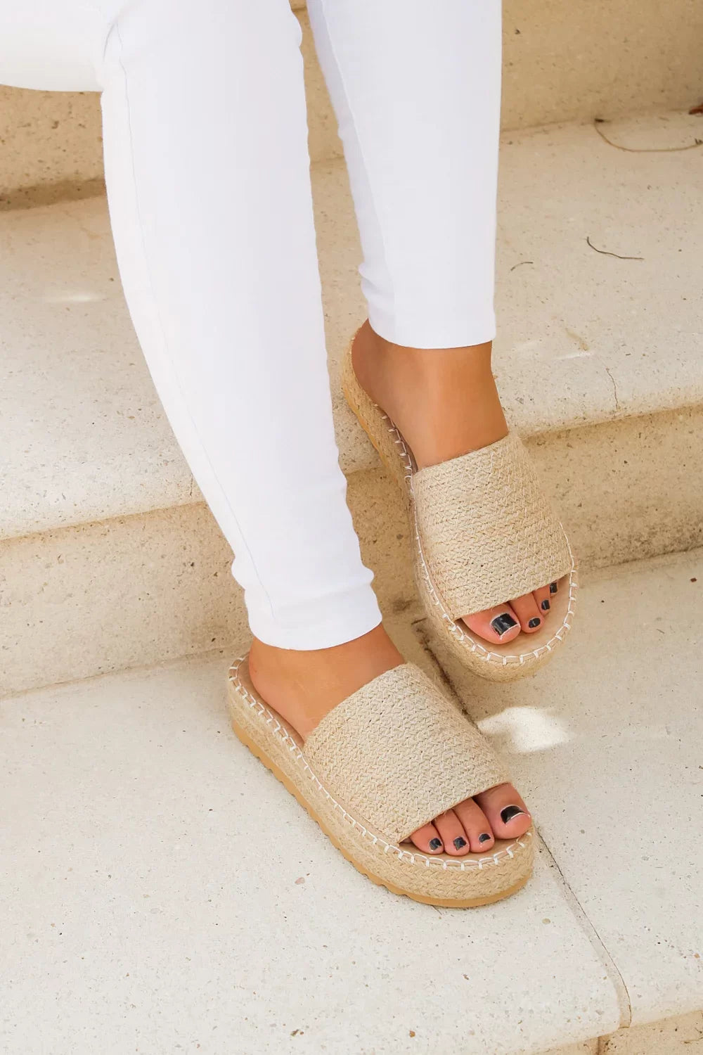 RAFFIA SHOE (DEL MAR NATURAL) worn with white pants, showcasing trendy coastal style for summer outfits Texas.