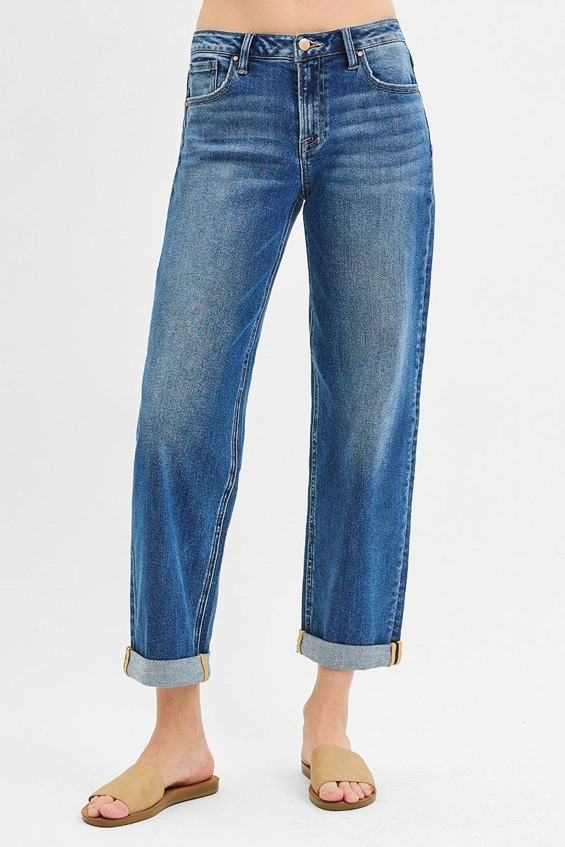 Dark wash mid rise boyfriend roll-up jeans, perfect for coastal boutique clothing and casual styling.