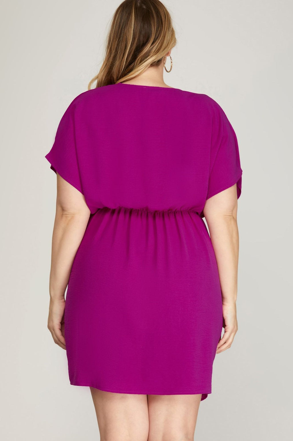 Back view of a magenta dolman sleeve dress, perfect for coastal boutique clothing and stylish plus size fashion.