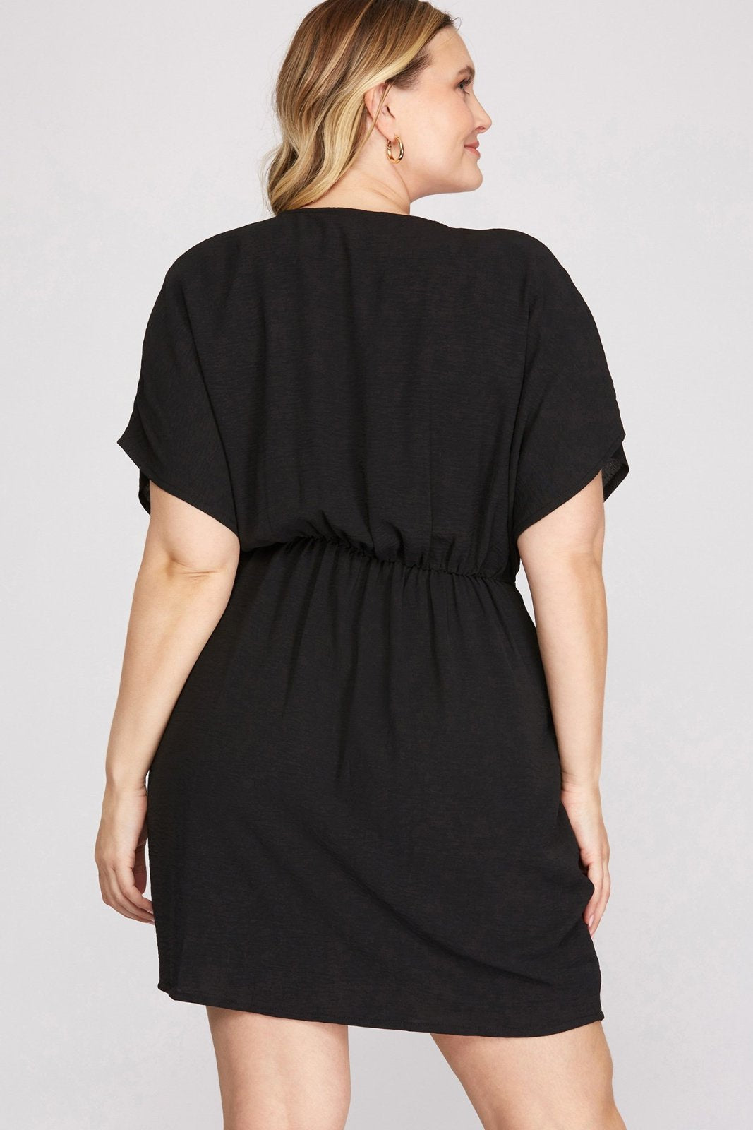 PLUS BLACK DOLMAN SLEEVE DRESS showcased from the back, perfect for trendy coastal style from Raggdoll Boutique.