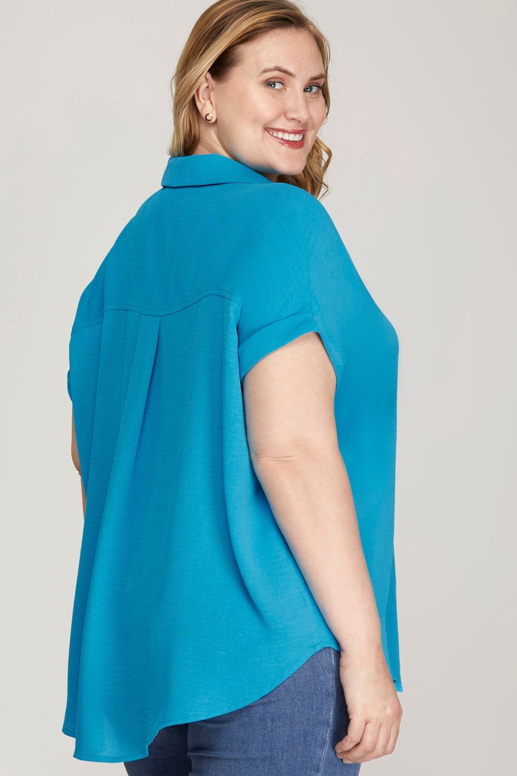 PLUS DIVA blue collared top, a stylish addition to coastal boutique clothing for curvy women, perfect for tropical vacations.