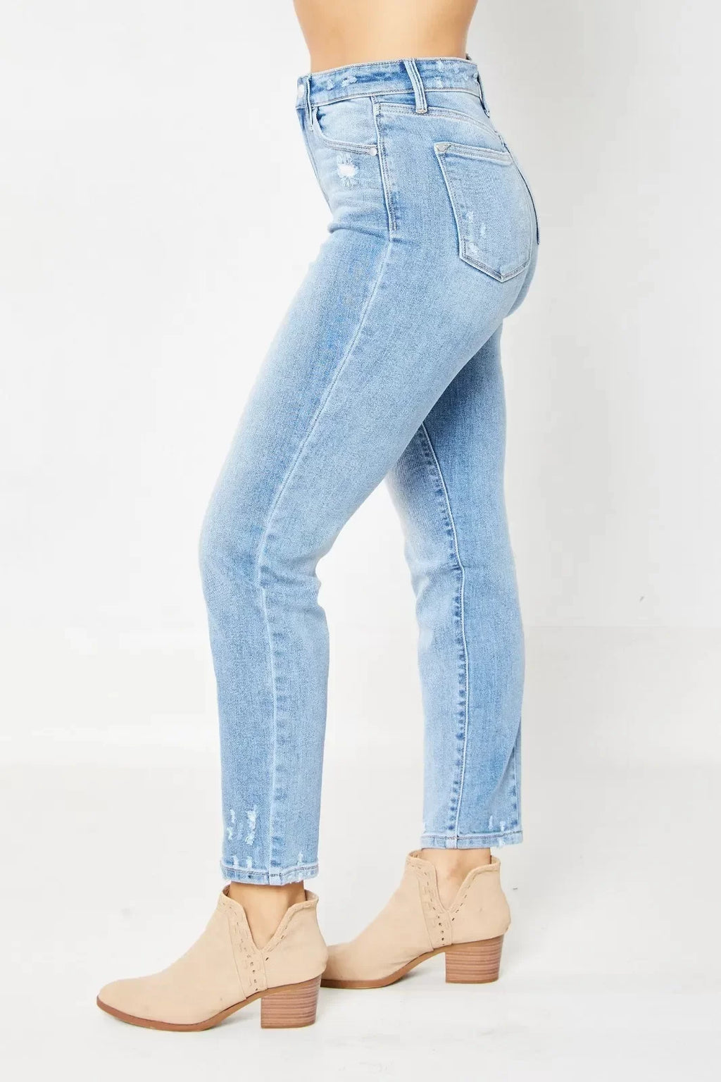 JUDY BLUE HW DESTROY & BACK HEM DART SLIM JEAN styled with trendy shoes, perfect for summer outfits Texas from Raggdoll Boutique.