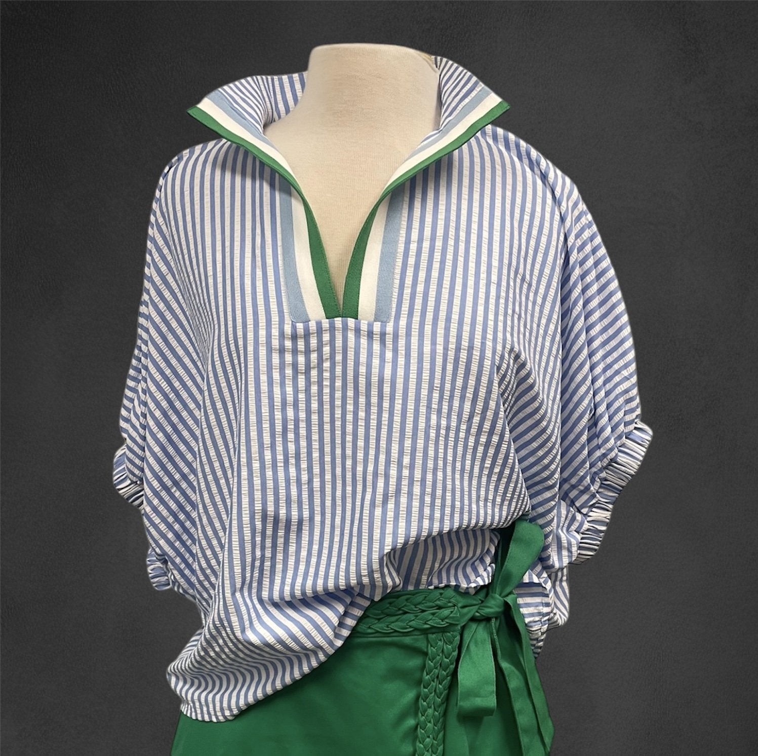 Fresh blue and white striped top with Kelly green detail, perfect for coastal boutique and tropical vacation outfits.