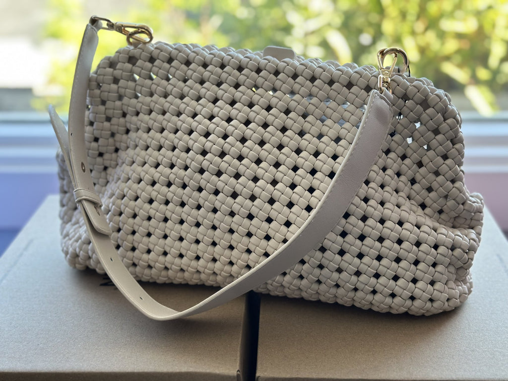 BC BRAIDED MEDIUM CLUTCH from Raggdoll Boutique, perfect for trendy coastal style and summer outfits Texas.