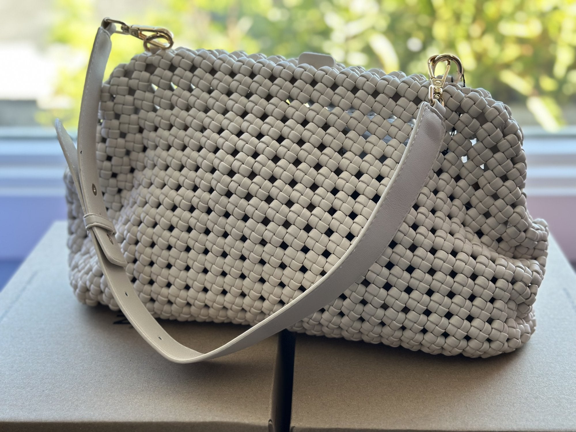BC BRAIDED MEDIUM CLUTCH from Raggdoll Boutique, perfect for trendy coastal style and summer outfits Texas.