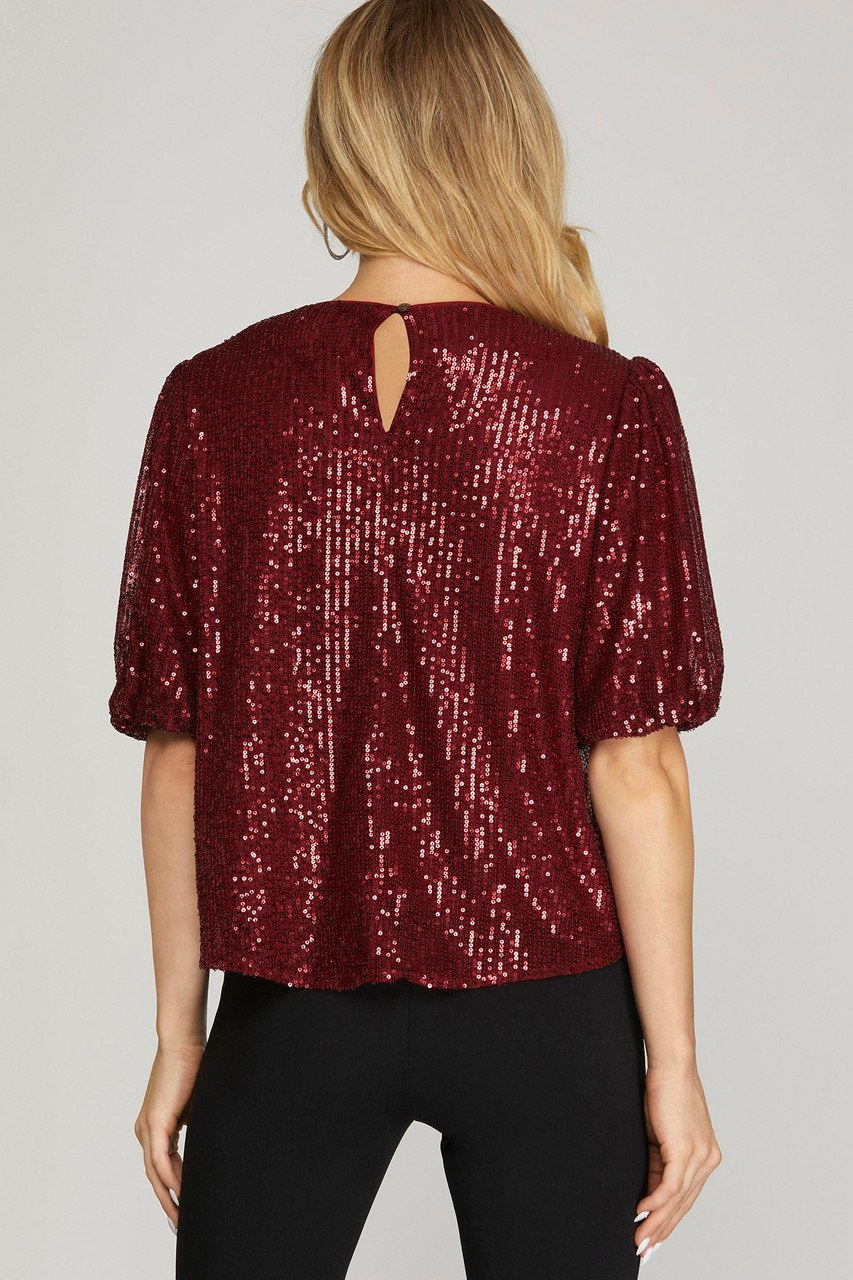 Stylish red sequin top with half puff sleeves, perfect for coastal boutique clothing and curvy plus size fashion.