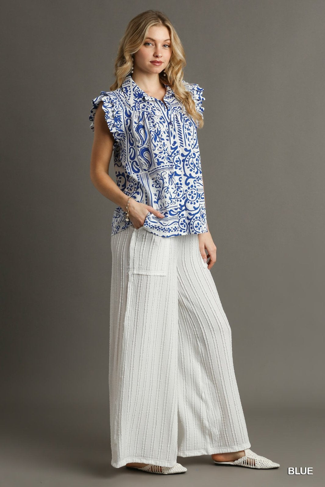 Royal and White Button Down Top from Raggdoll Boutique, perfect for trendy coastal style in Port Aransas.