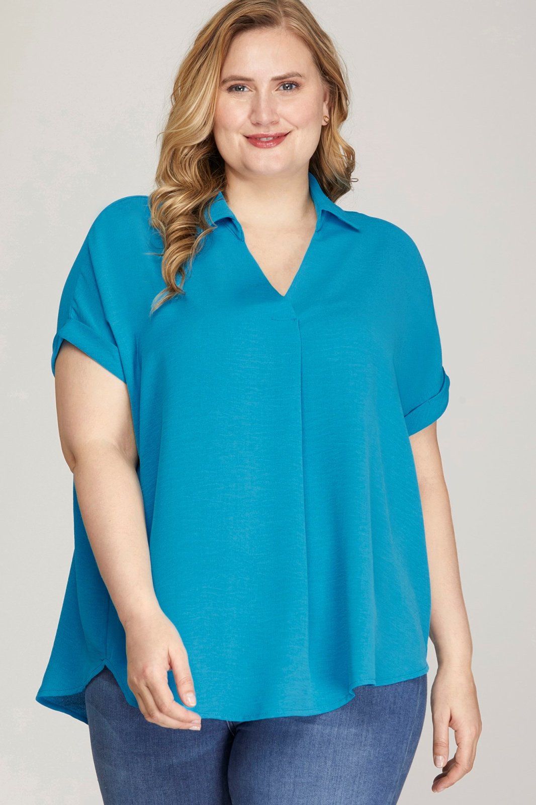 Stylish PLUS DIVA blue collared top for curvy women, perfect for coastal boutique clothing and tropical vacation dresses.