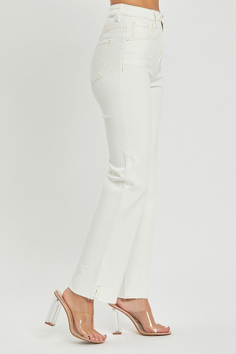 Risen Cream Jeans in white denim, perfect for casual outings and stylish pairings at coastal boutiques.